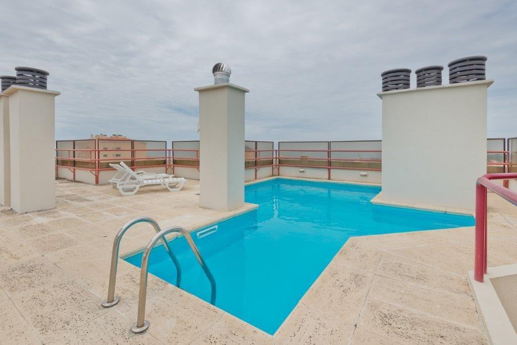 2 bedroom apartment with a swimming pool in gated community