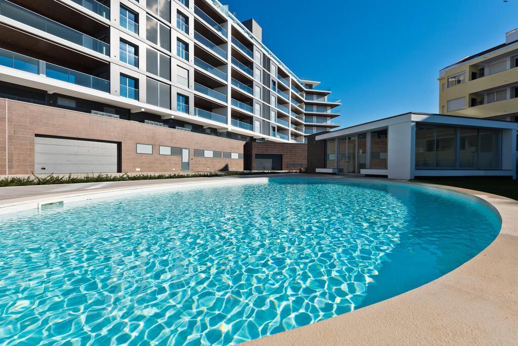 1 bedroom apartment with a swimming pool in gated community