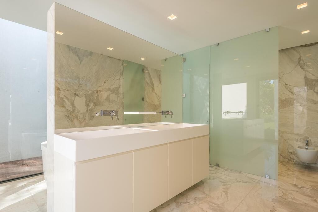 Maison normal T5+2 avec piscine dans un condominium fermé